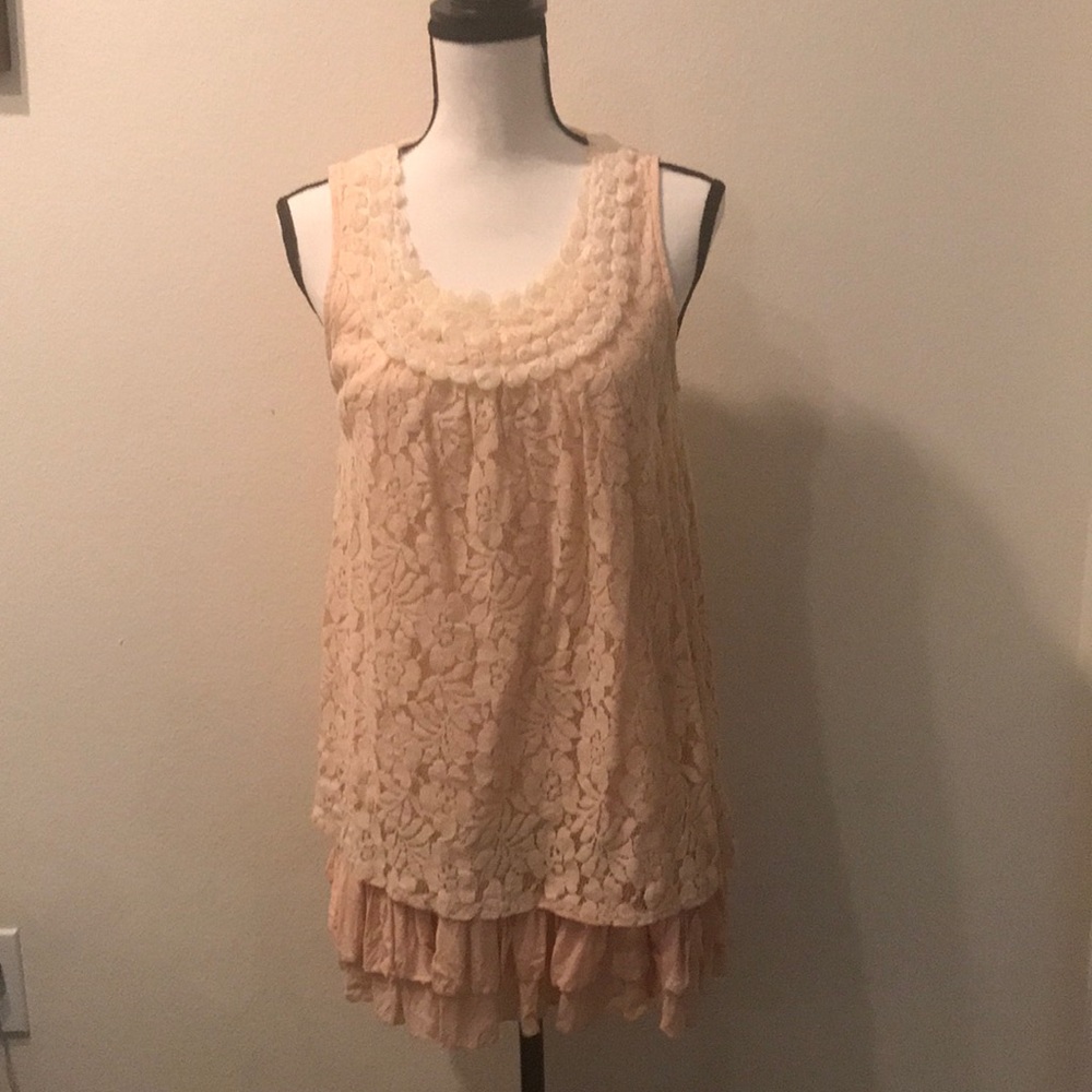 Peach colored tunic. Size M